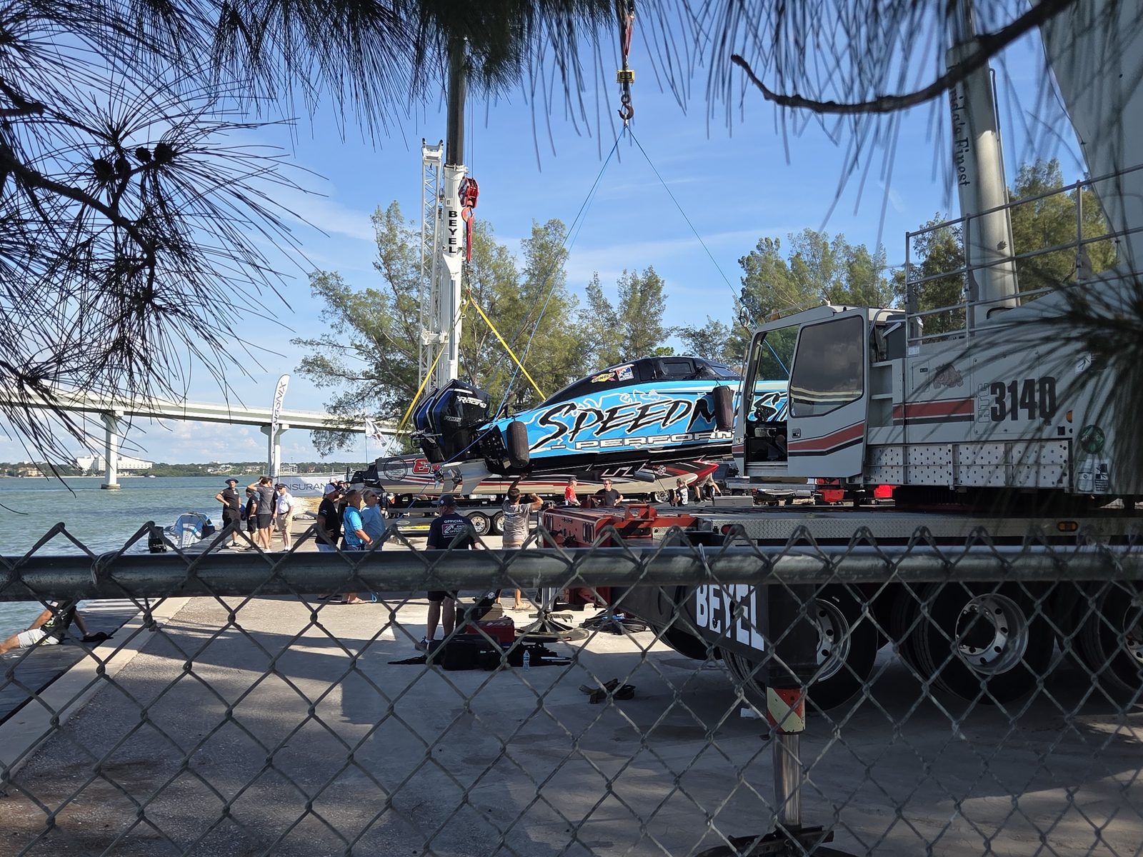 Crane launch at the ramp — how the big hulls get wet