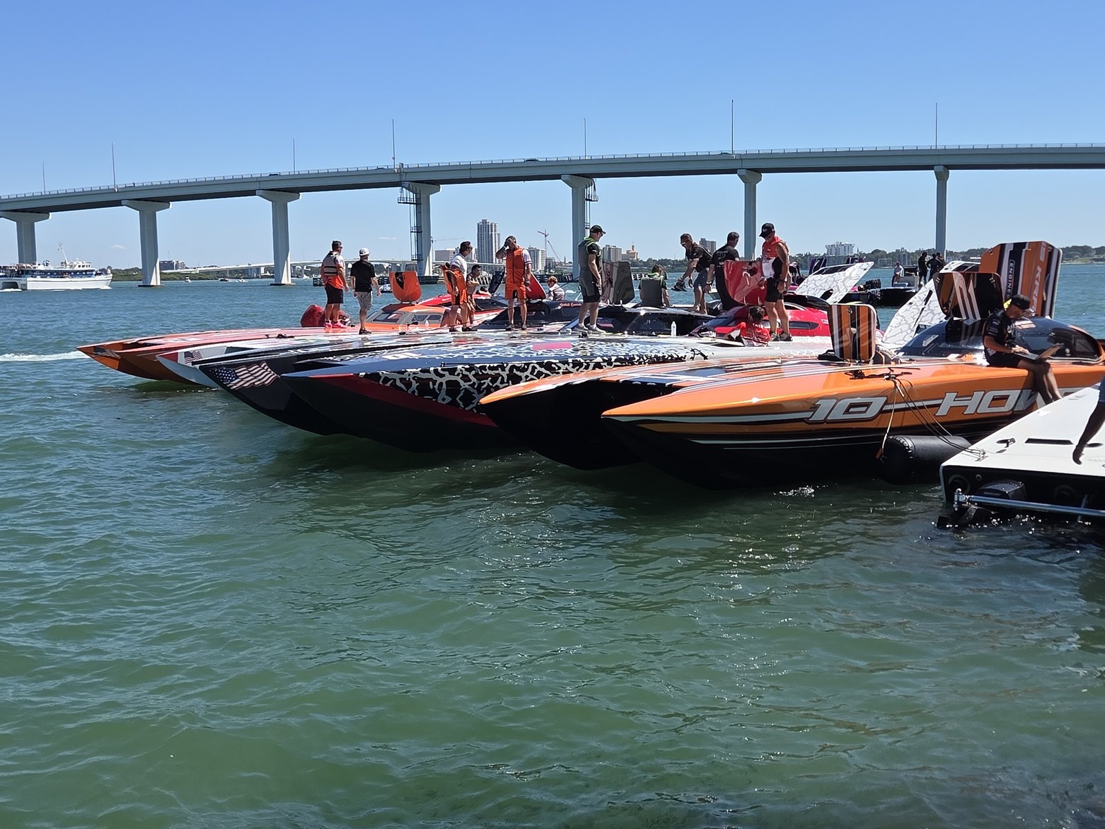 Race boats lined up under the bridge at Clearwater