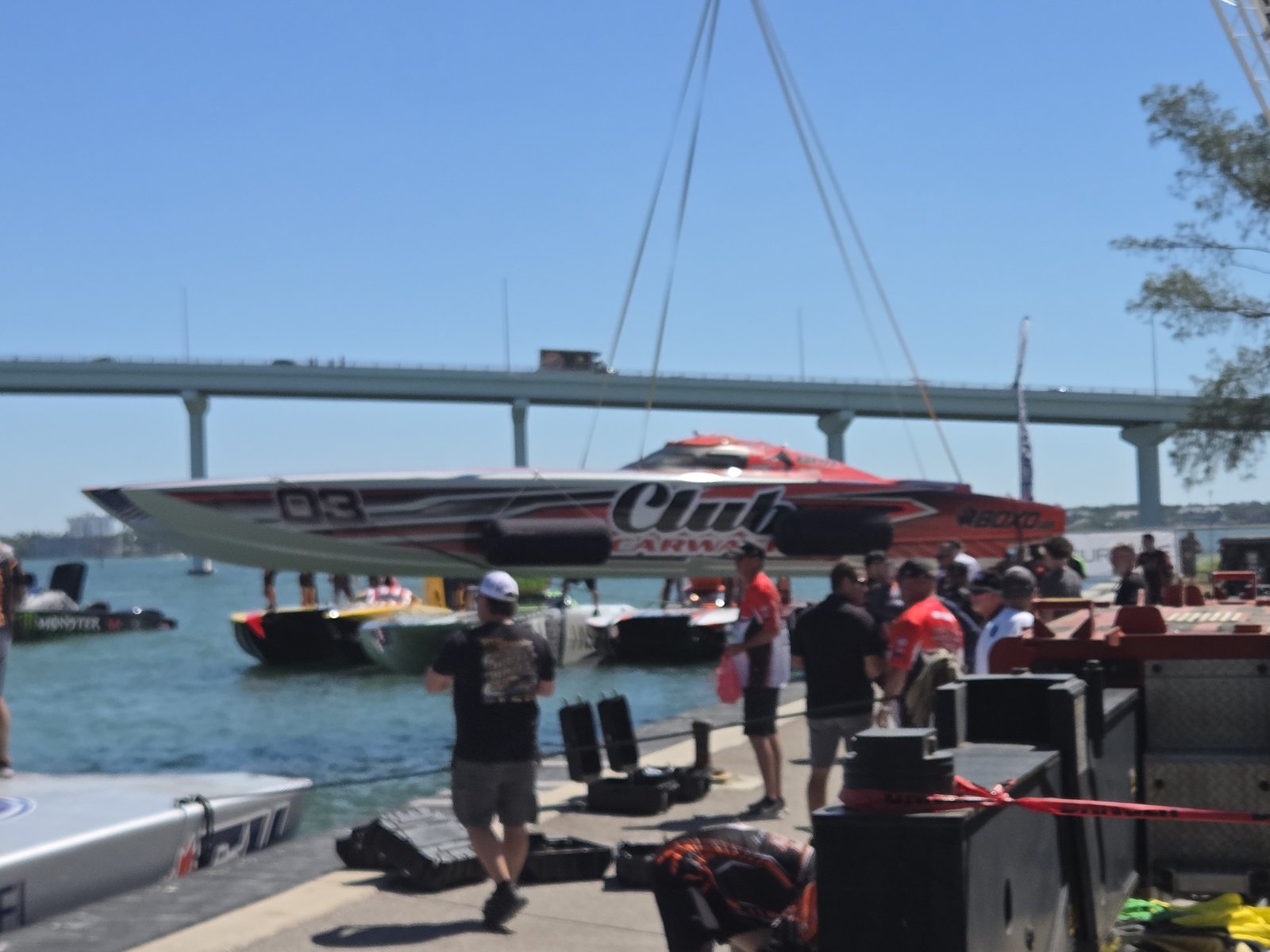 Pit crews working the boats along the seawall