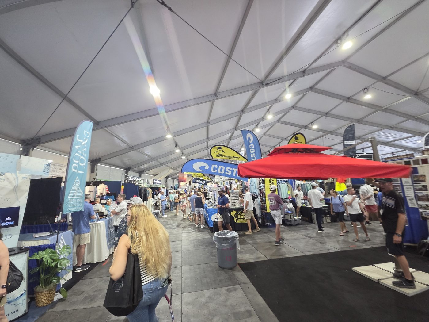 Busy exhibit tent aisle at FLIBS 2026