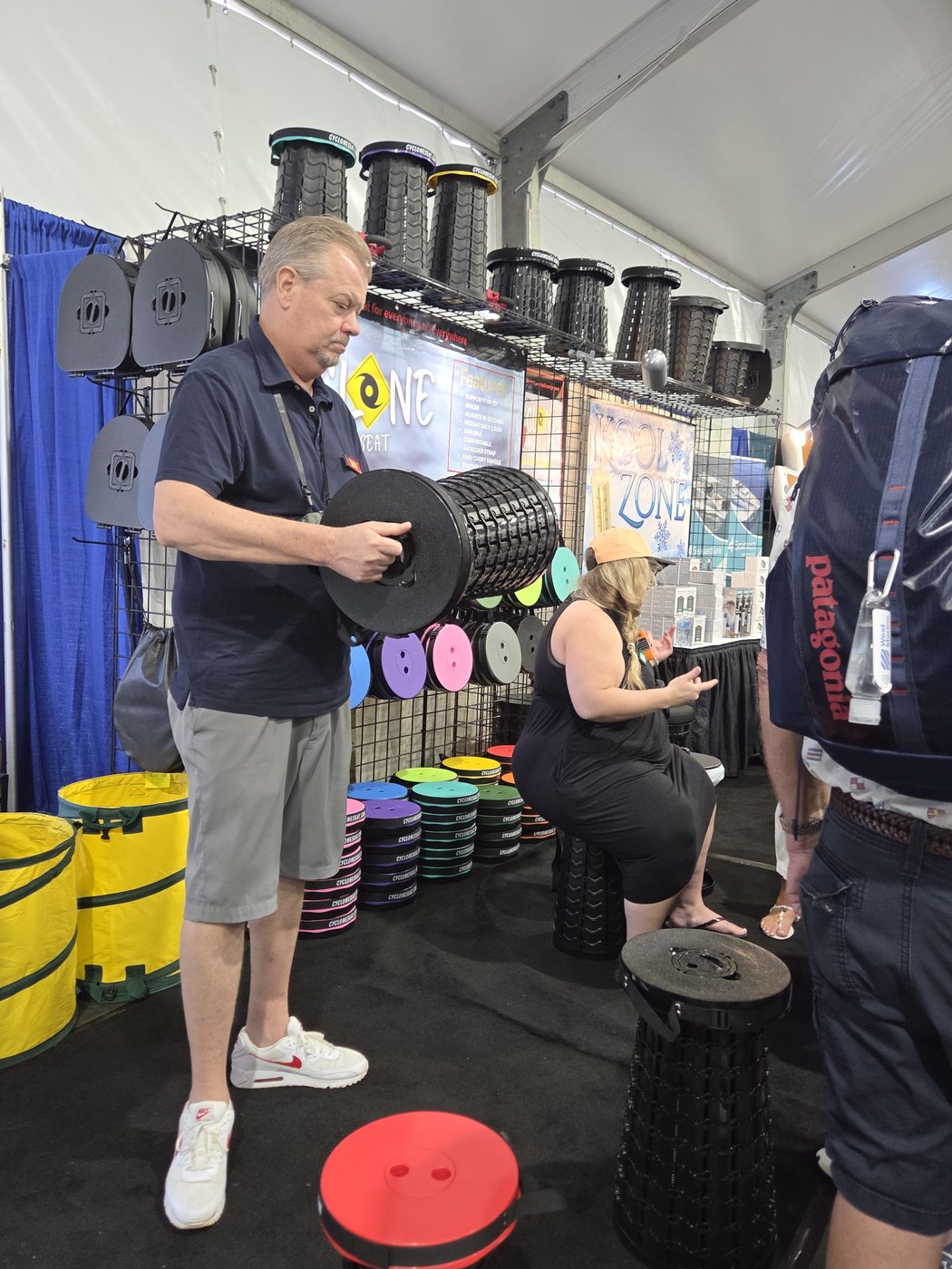 Cyclone booth with colored spool lids