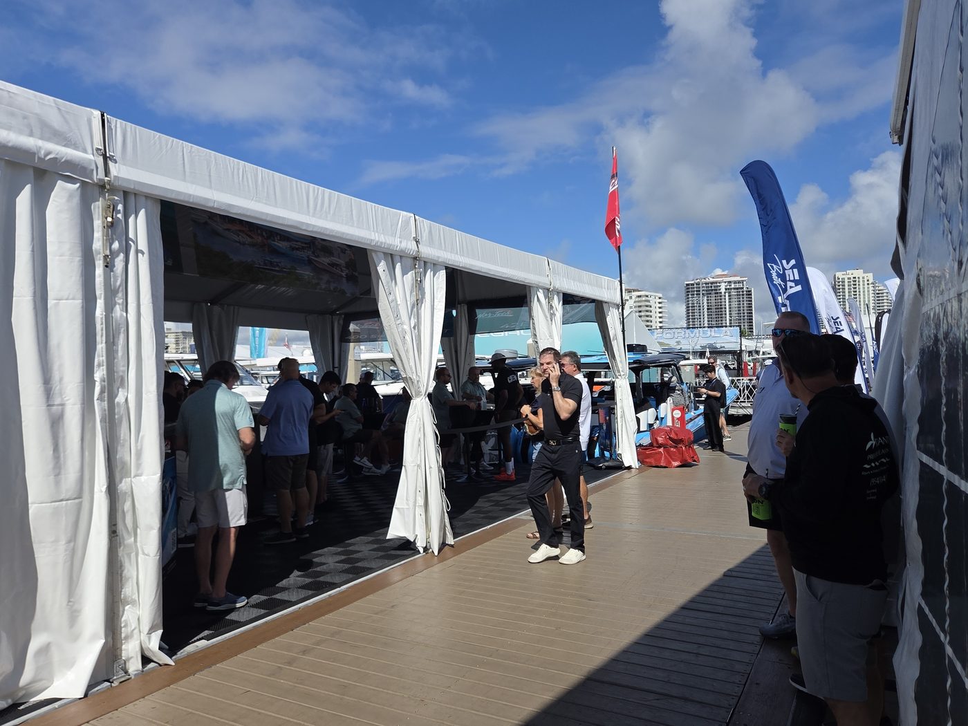 Open-sided exhibit tent on the dock at FLIBS 2026