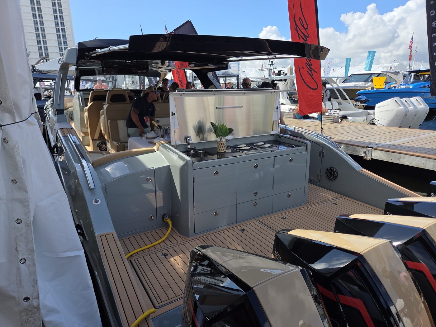 Cigarette cockpit and wet bar behind the six-outboard transom