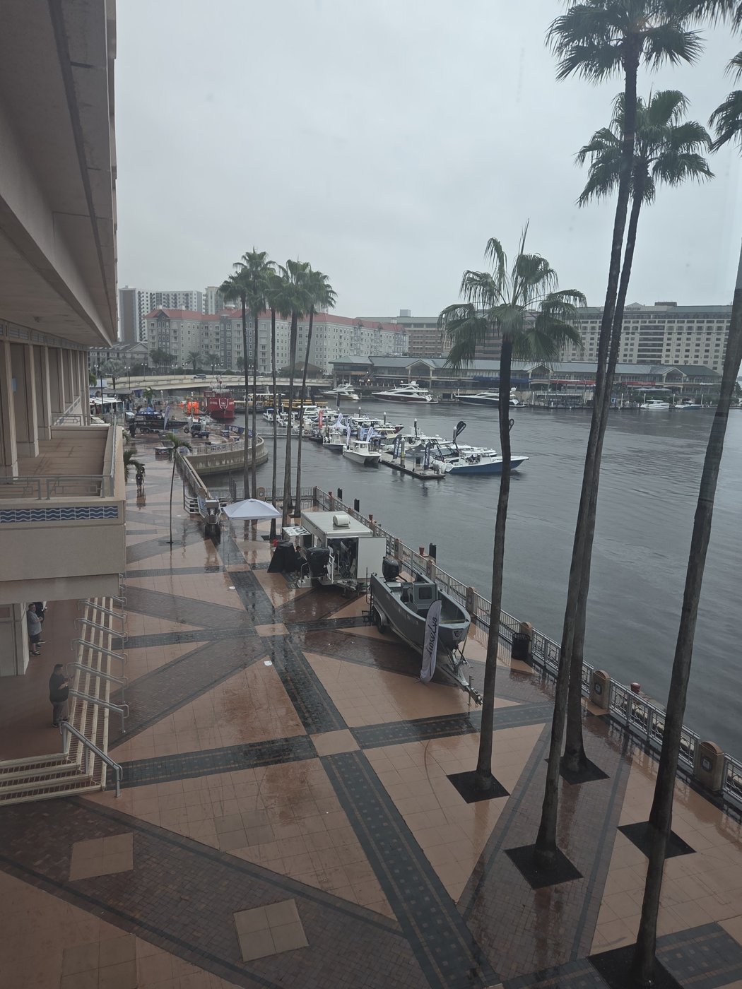 Tampa Riverwalk and marina in the rain beside the convention center