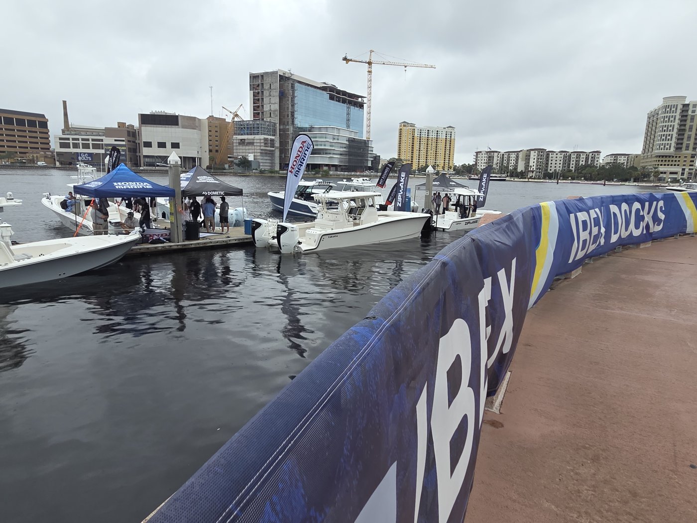 IBEX Docks banner with Honda Marine and ZipWake flags