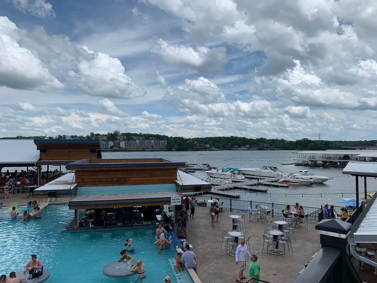 Dog Days Bar and Grill waterfront with boats docked at Lake of the Ozarks