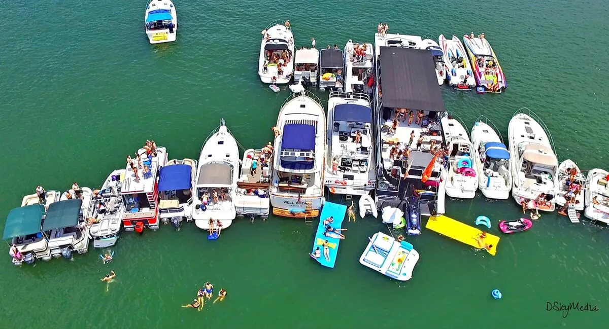 Boats packed into Devils Cove at Lake Travis Texas