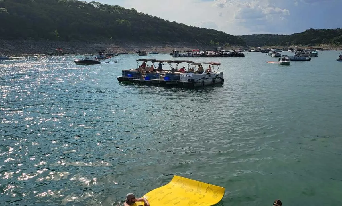 Boats on Lake Austin Texas with the Austin skyline in the background