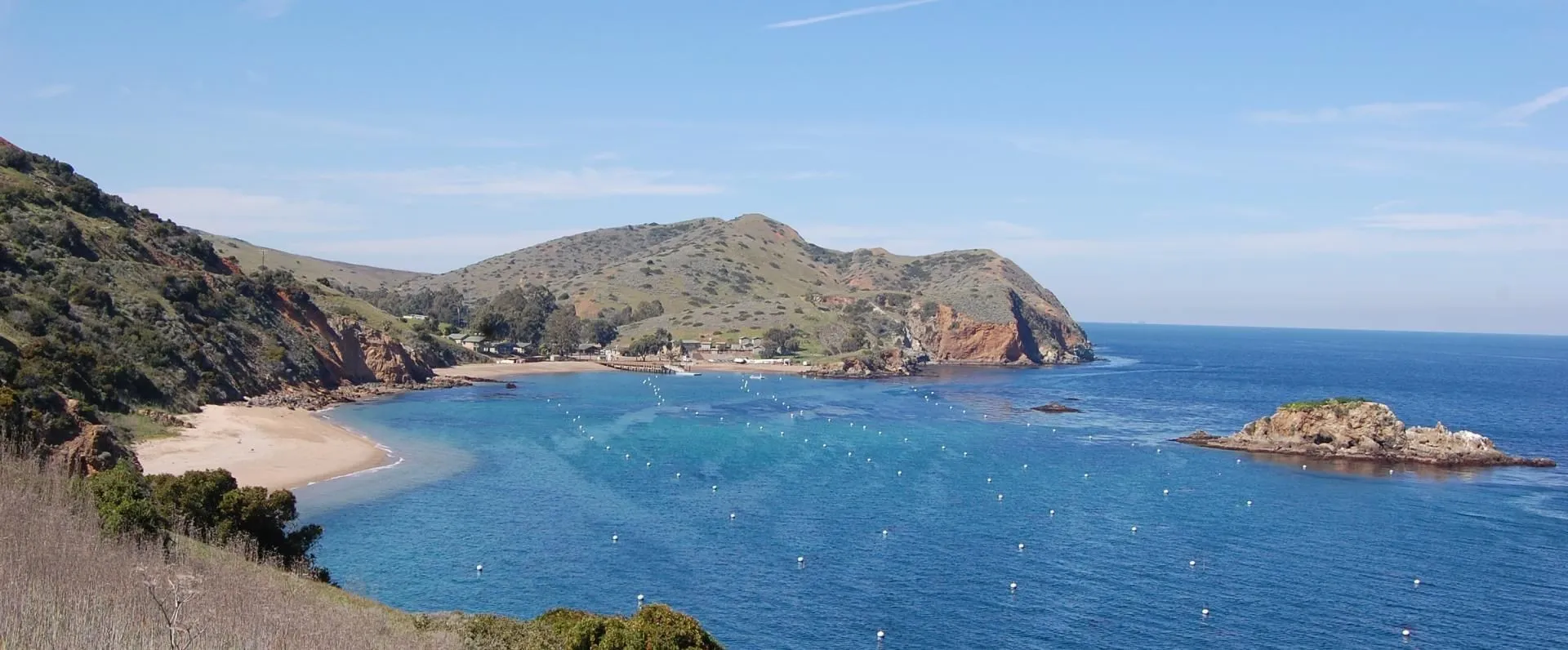 Boats anchored in Emerald Bay at Catalina Island California with clear water