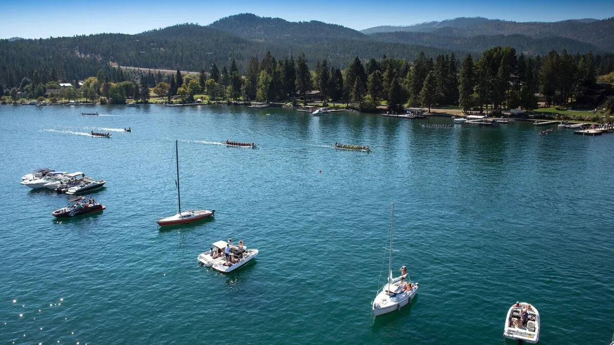Crystal clear water at Flathead Lake Montana with mountains in the background