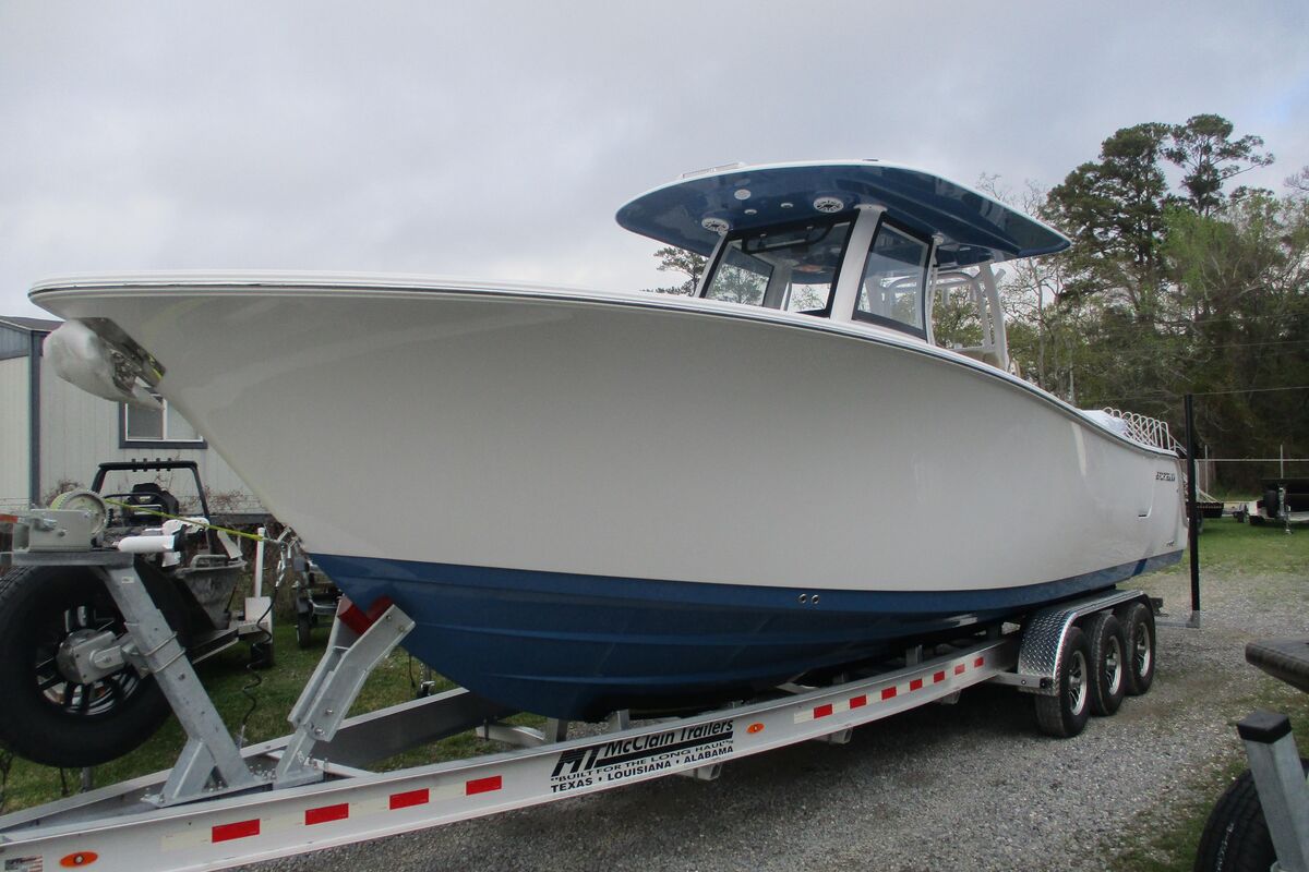 Complete boat, motor, and trailer package ready for sale
