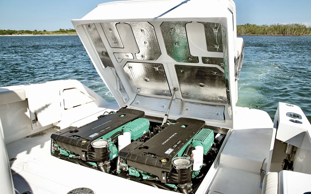 Stern drive boat at a marina with I/O unit visible